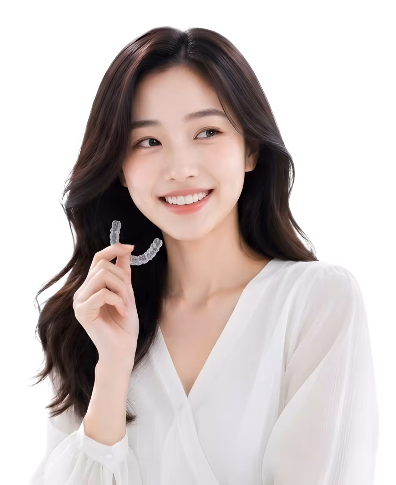Adult patient holding a clear Invisalign aligner tray at Lau Dental Clinic Sri Petaling, Kuala Lumpur.